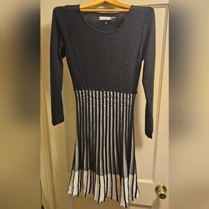 Calvin Klein black and white pleated,‎ flared, knit dress